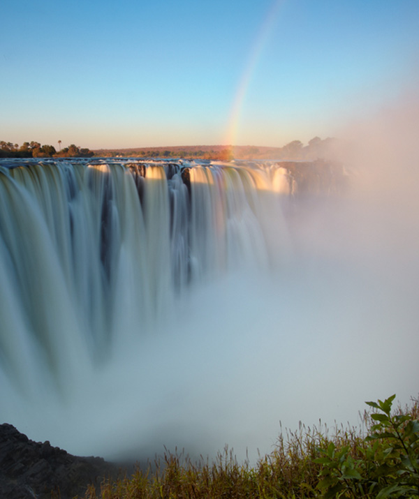 Step Into a World of Adventure - Horse Riding Volunteering Zimbabwe Adventurous horse riding volunteer exploring scenic landscapes near Victoria Falls with Wild Bhiza Stables