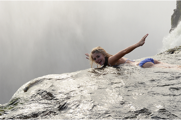 Devils Pool Victoria Falls Edge Zambia Zimbabwe Devils Pool natural infinity pool on the edge of Victoria Falls, Zambia side, near Zimbabwe