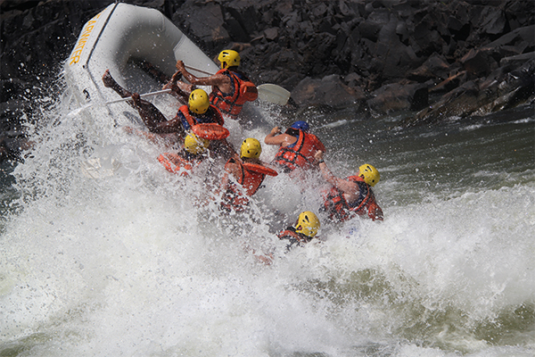 ite Water Rafting Zambezi River Victoria Falls Zimbabwe White water rafting adventure on the Zambezi River rapids below Victoria Falls, Zimbabwe